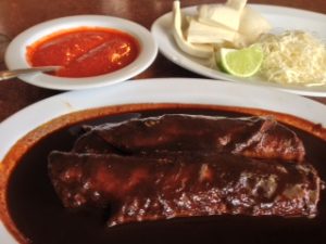 Oaxcan cuisine is famous for it's Mole's.  El Fortin offers several different kinds, all made in Oaxaca.
